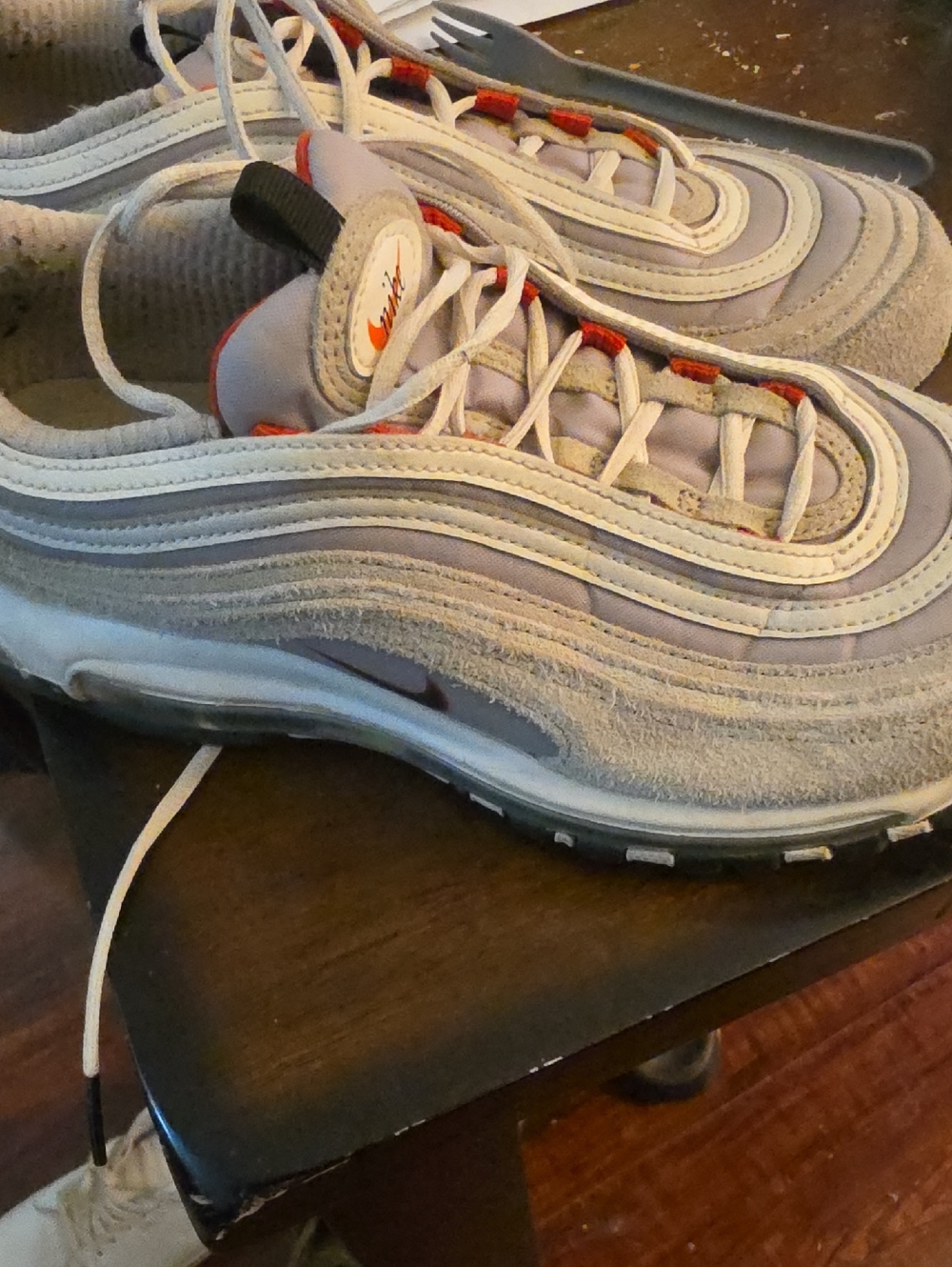 Nike Air Max 97 Sneakers in Light Gray with Orange Highlights